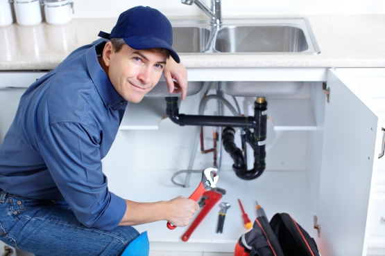 Blue Wave Plumbing team member at work